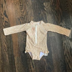 Rylee and Cru rash guard swimsuit. Stain pictured. Price reflects stain. 6-12mo